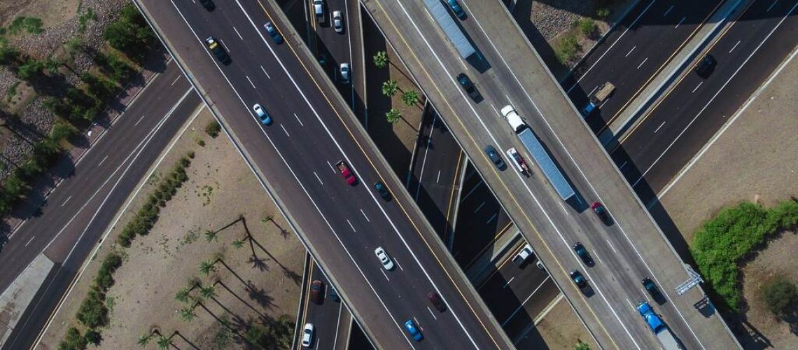 aerial-view-busy-highway-intersection-full-traffic-daytim